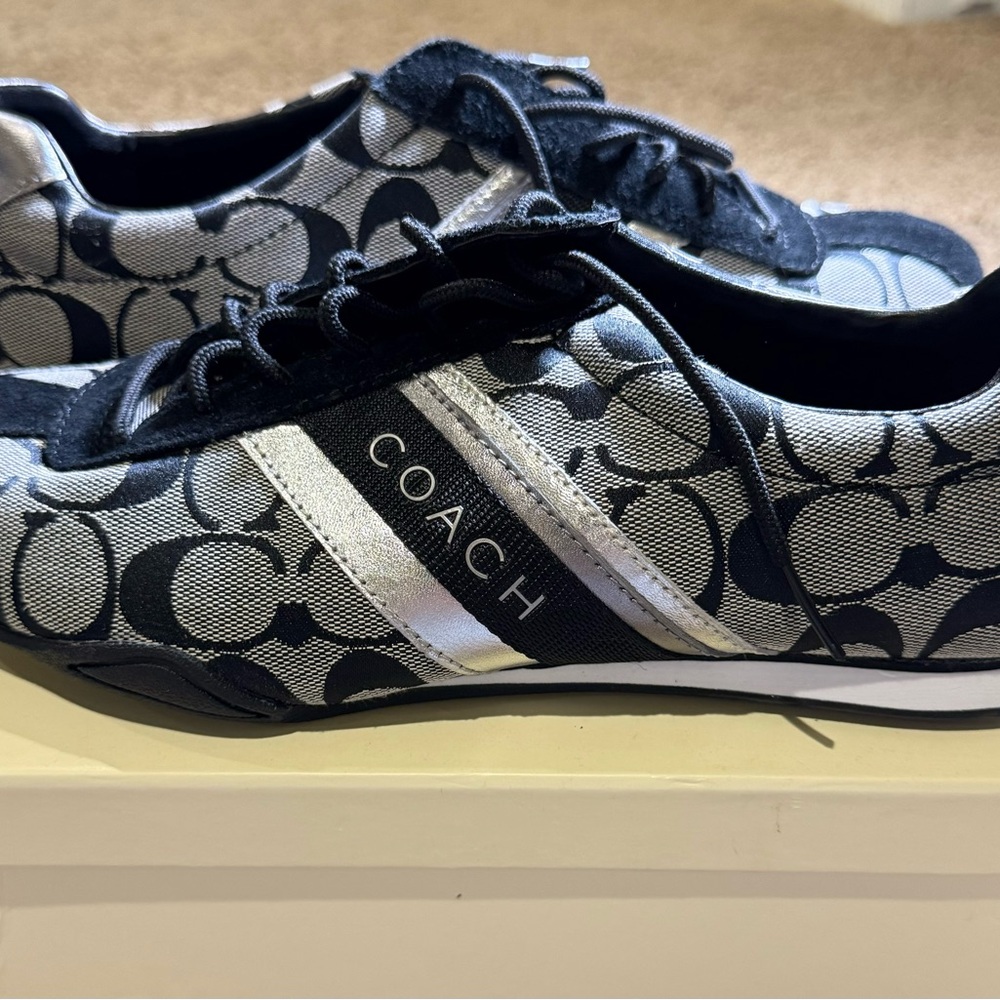 Brand new black coach shoes. Never worn